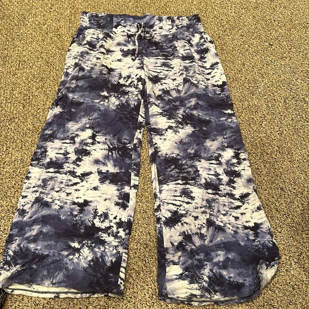 Two pairs of peace and pearls pants